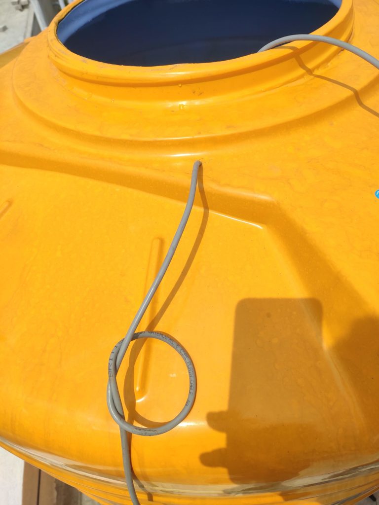 Sensor cable installed in overhead tank